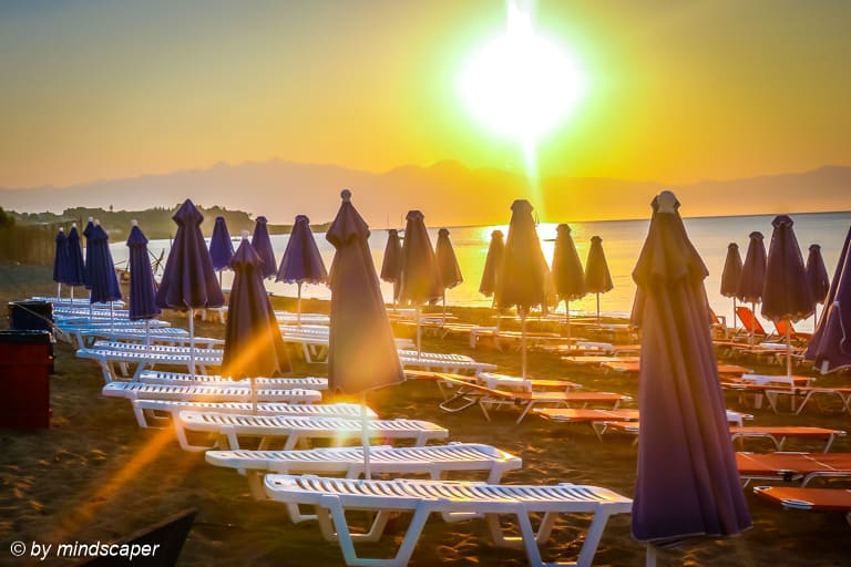 Umbrellas in the Sunrise Sun - Sea and Sun Story